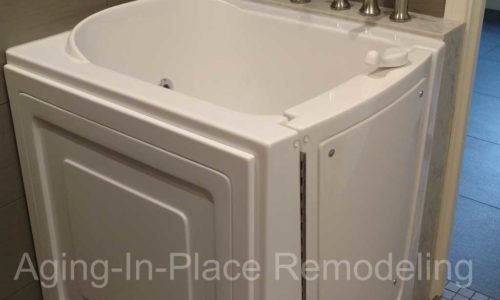 Walk-in tub with a ceiling lift for easy transfer.