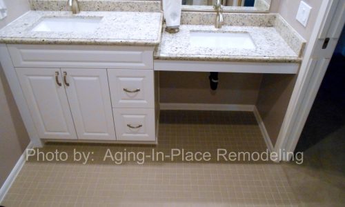 Wheelchair accessible bathroom remodel with barrier free roll in shower, grab bars, hand held shower head, roll under wheelchair accessible sink