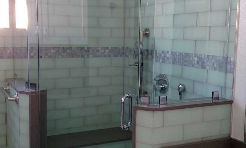 Bathroom remodel with low threshold shower, built in shower bench, grab bars and custom tile