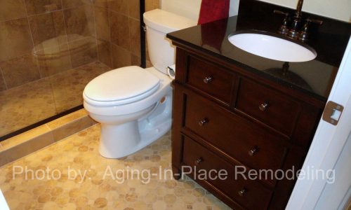 Bathroom Remodel with low threshold shower, grab bars custom tile