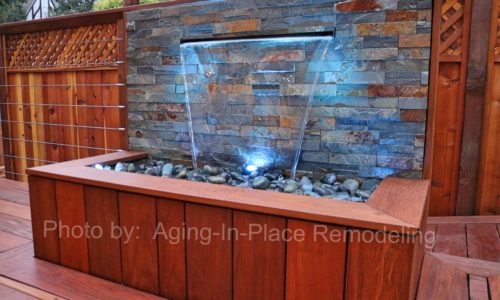 Water element, fountain, custom ipe deck, outdoor living space