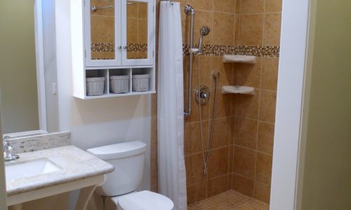 Barrier Free Bathroom Remodel, grab bars, fold up shower seat, tile roll in shower, accessible renovations, aging in place remodeling, roll under wheelchair accessible sink