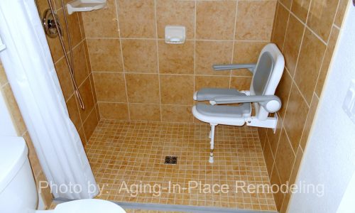 Barrier Free Bathroom Remodel, grab bars, fold up shower seat, tile roll in shower, accessible renovations, aging in place remodeling, roll under wheelchair accessible sink