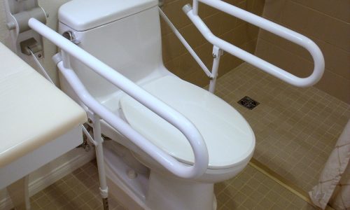 Barrier Free Bathroom remodel with fold up shower seat, fold up safety rail,raised toilet, roll-in shower, roll under sink, accessible renovations, aging in place remodeling