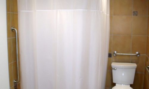 Barrier Free Bathroom Remodel with Wheelchair shower and sink, grab bars