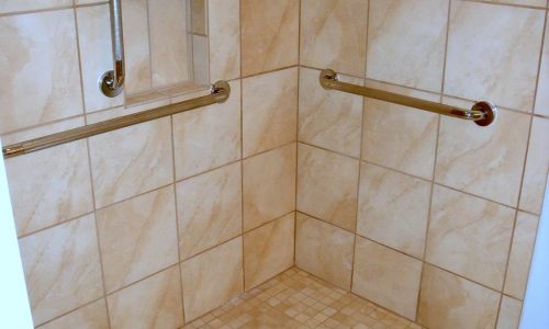 Accessible Bathroom Remodel to include tile roll-in shower, roll under sink and grab bars
