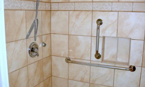 Accessible Bathroom Remodel to include tile roll-in shower, roll under sink and grab bars