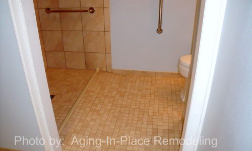 Accessible Bathroom Remodel to include tile roll-in shower, roll under sink and grab bars