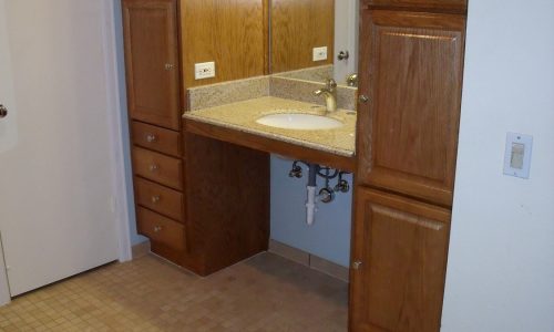 Accessible Bathroom Remodel to include tile roll-in shower, roll under sink and grab bars