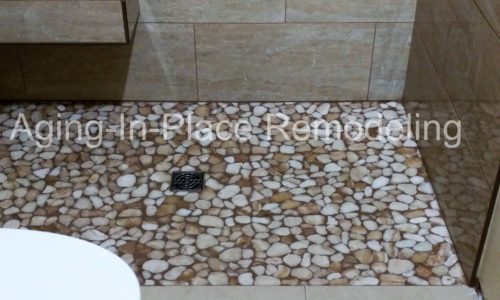tile barrier free shower with built in shower seat for wheelchair accessibility