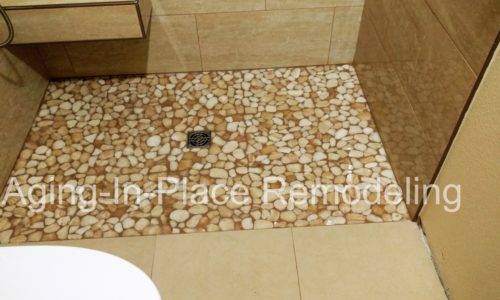 tile barrier free shower with built in shower seat for wheelchair accessibility