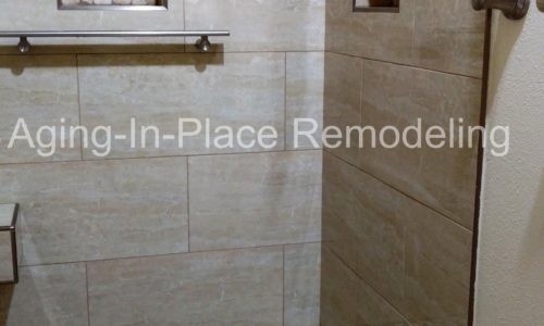 Wheelchair Accessible shower with custom tile accents