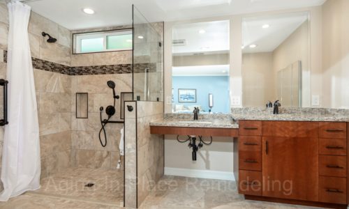 Barrier Free Shower, Wheelchair Accessible, Roll-In Shower, Roll Under Vanity, Fold Down Shower Seat, Raised Toilet, Automated Closet Bars that lower at the touch of a button,