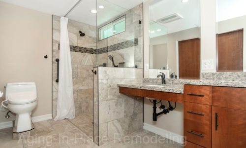 Barrier Free Shower, Wheelchair Accessible, Roll-In Shower, Roll Under Vanity, Fold Down Shower Seat, Raised Toilet, Automated Closet Bars that lower at the touch of a button,