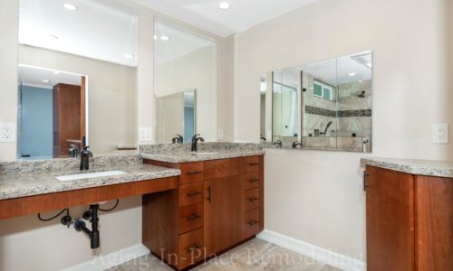 Barrier Free Shower, Wheelchair Accessible, Roll-In Shower, Roll Under Vanity, Fold Down Shower Seat, Raised Toilet, Automated Closet Bars that lower at the touch of a button,