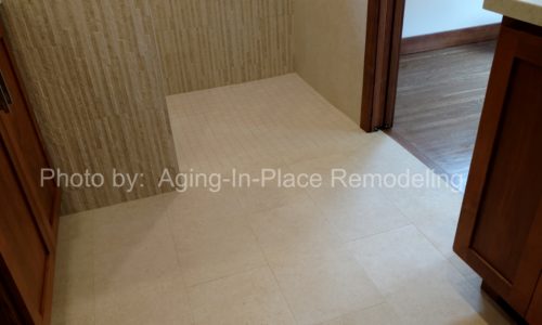 Custom tile, barrier free roll in shower with grab bars for wheelchair accessibility