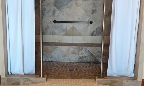 Zero threshold tile shower entrance replaces Low Threshold shower entrance