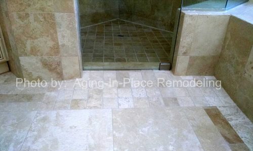 No threshold tile shower entrance replaces low threshold shower step over