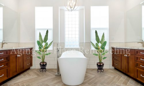 Bathroom remodel with low threshold shower, elegant flooring and gorgeous fixtures