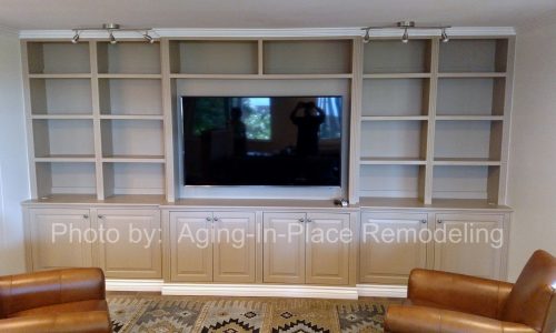 Custom entertainment center built to fit all of client's needs