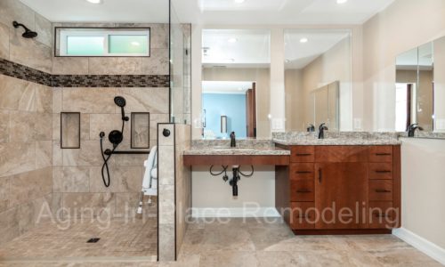 Wheelchair accessible bathroom with roll under sink, roll-in shower, custom built vanity