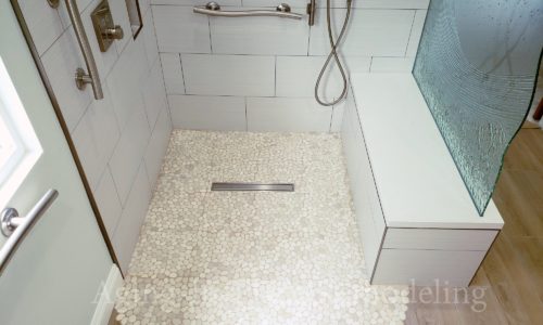 Master Bathroom Remodel with Barrier Free Shower, Chrome USA Grab Bars, Rain Shower head and Hand Held Shower head.  Custom Glass Shower Wall and Custom Tile 