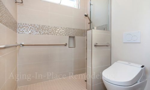 Master bathroom that includes wheelchair accessible shower, grab bars, bidet toilet
