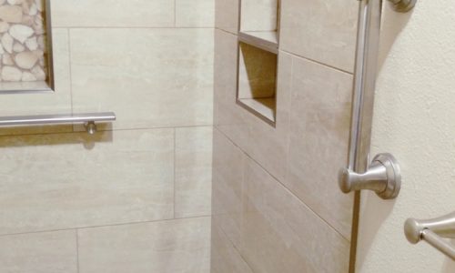 Custom tile accessible shower with grab bars